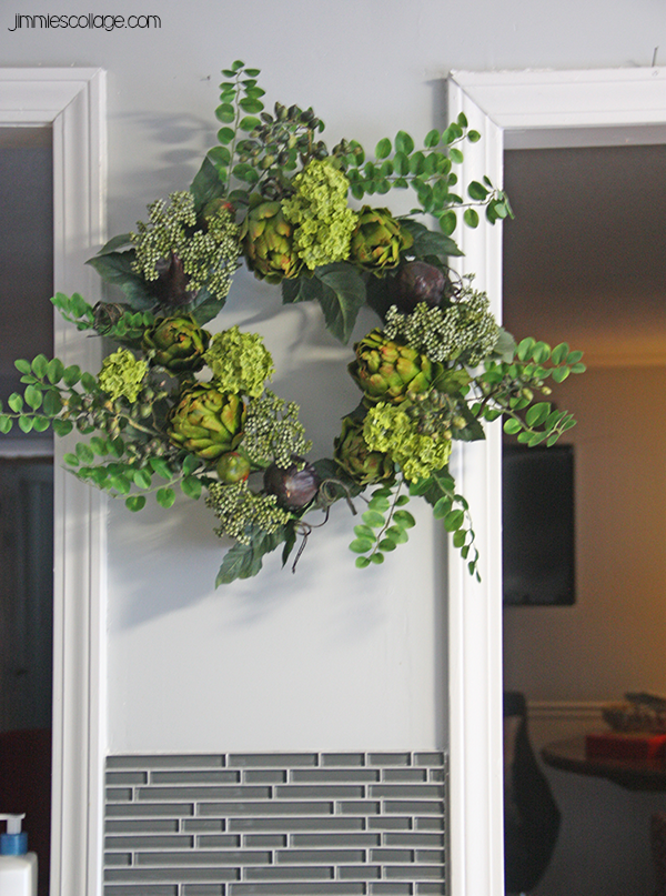 artichoke and fig wreath on kitchen wall {wreath is courtesy of silkplantsdirect.com}